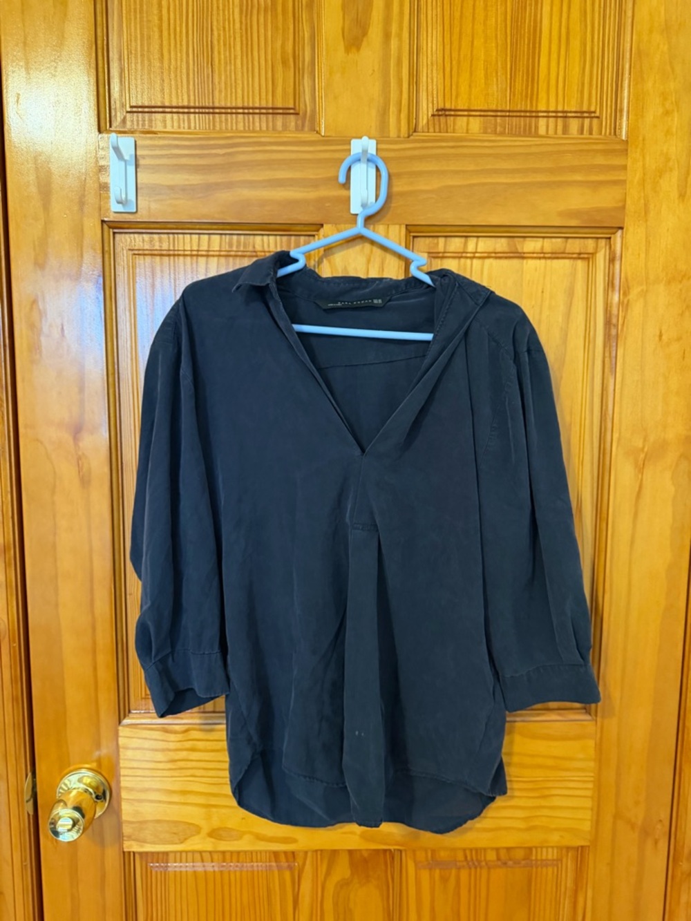 Women's Black V-Neck Blouse with Pleat Detail